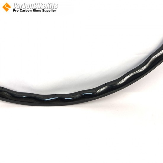 Llantas de carbono ligeras de 305 g 29er XC onduladas 31x23,5 mm de ancho interno 24 mm sin cámara y sin gancho asimétricas para MTB. Ruedas para bicicletas eléctricas. Llantas de carbono ligeras de 305 g 29er XC onduladas 31x23,5 mm de ancho interno 24 mm sin cámara y sin gancho asimétricas para MTB. Ruedas para bicicletas eléctricas.